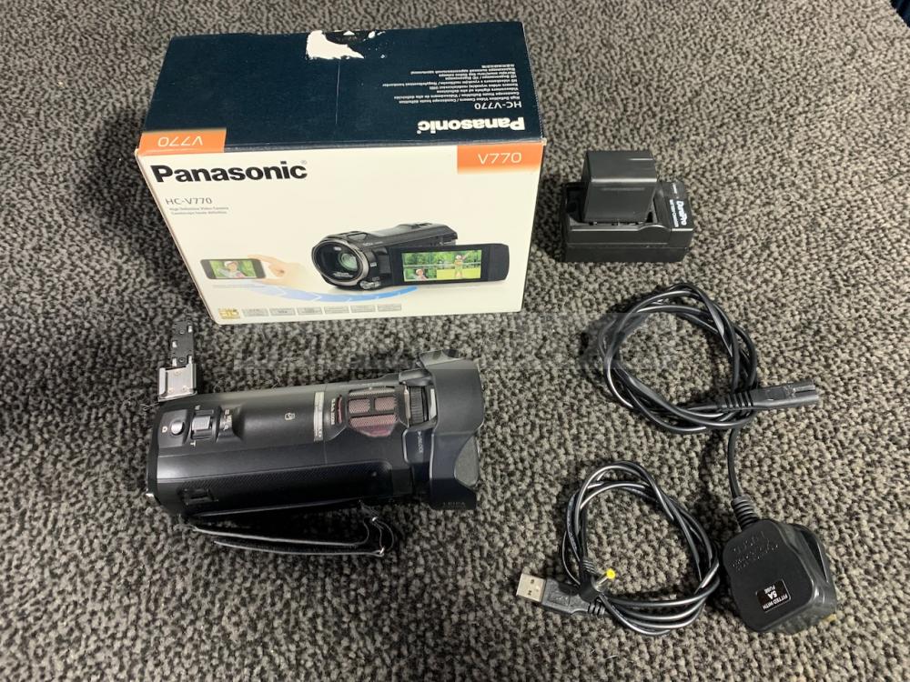 PANASONIC HC-V770 Full HD Camcorder, like new Panasonic HC-V770 Full HD Video Camera Kit showing Camcorder, sun hood, shoe adaptor, batteries (2 off, one installed in camera, one in charger), charger, mains cable, USB power cable and original box